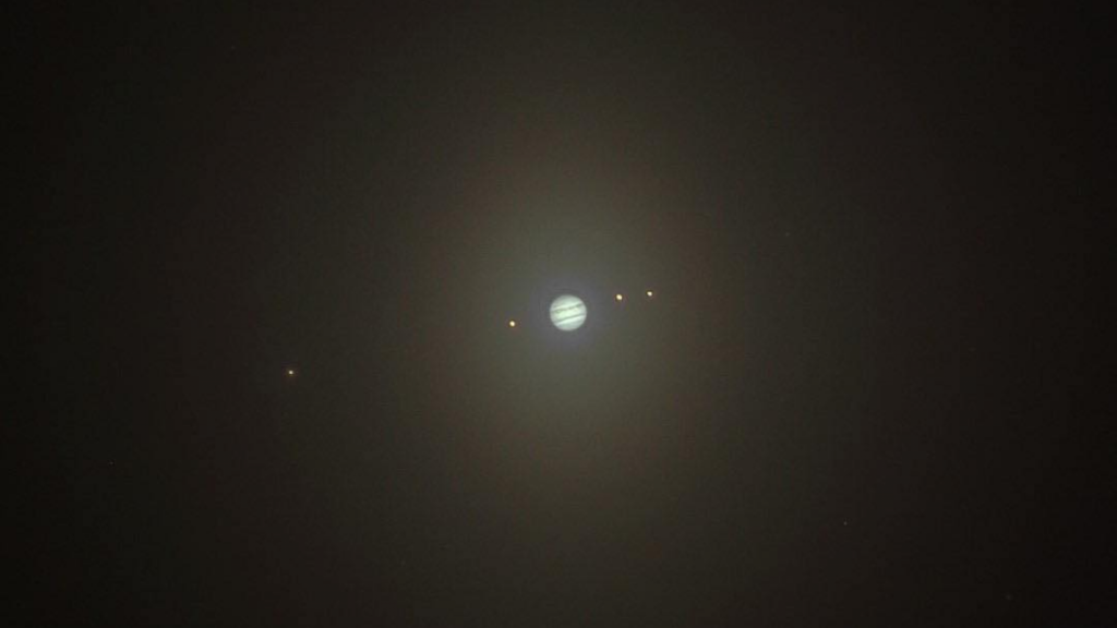 Watch what Jupiter looks like through the lens of a telescope, video